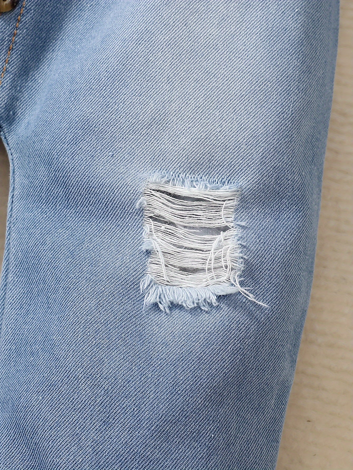Denim Dreamcatcher Romper for Children – Playful Ruffles and Edgy Details