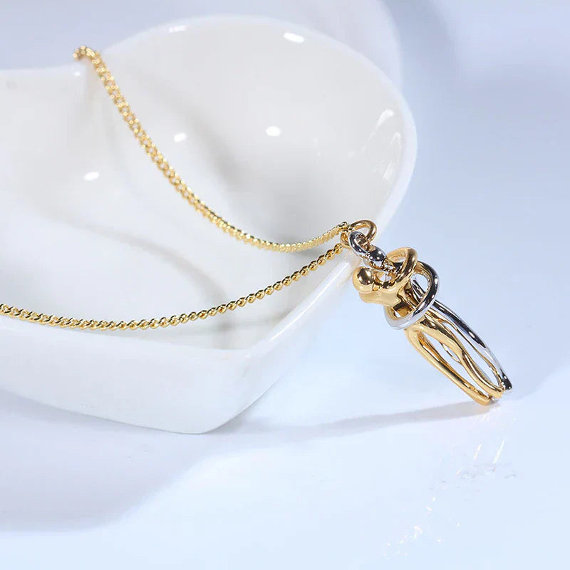 Necklace with Embracing Pendant – Timeless Symbol of Love