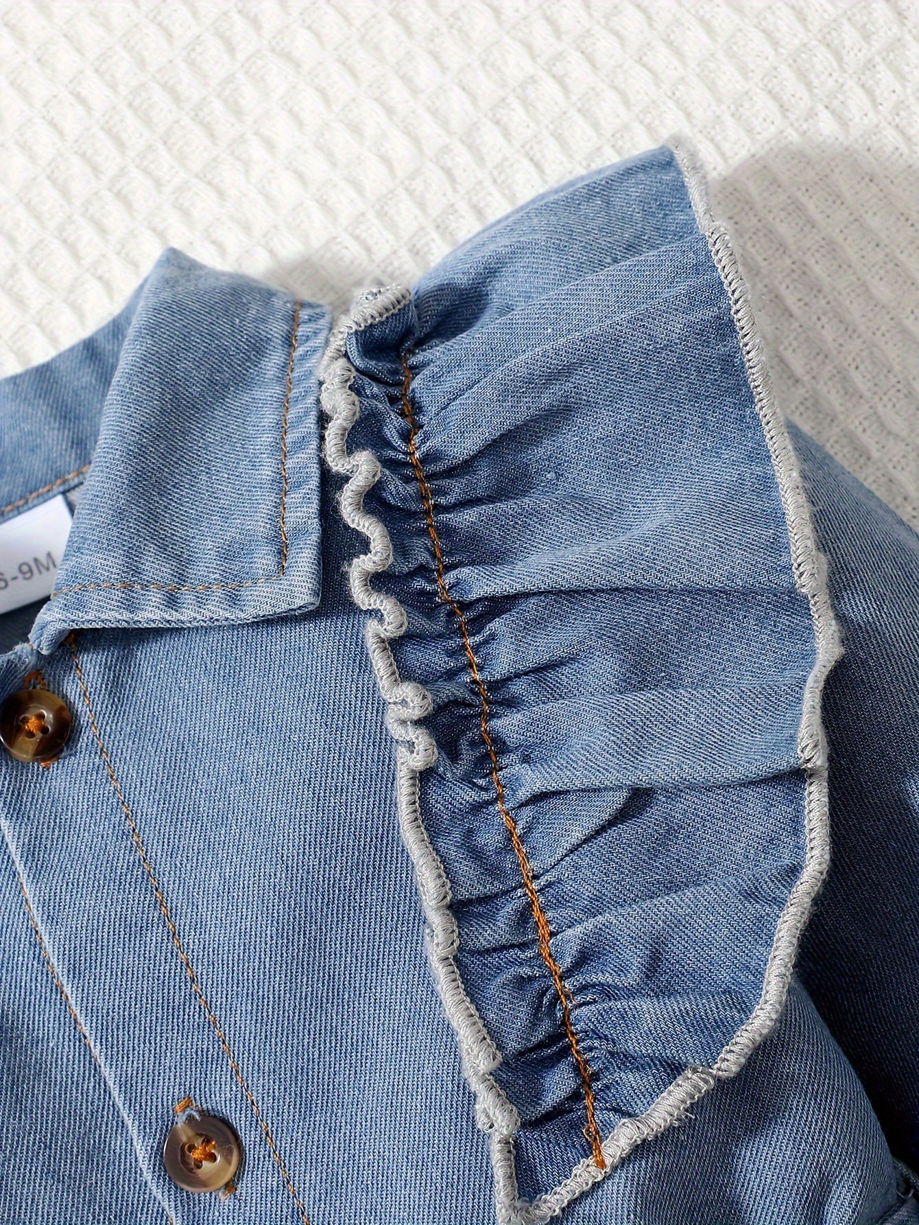 Denim Dreamcatcher Romper for Children – Playful Ruffles and Edgy Details
