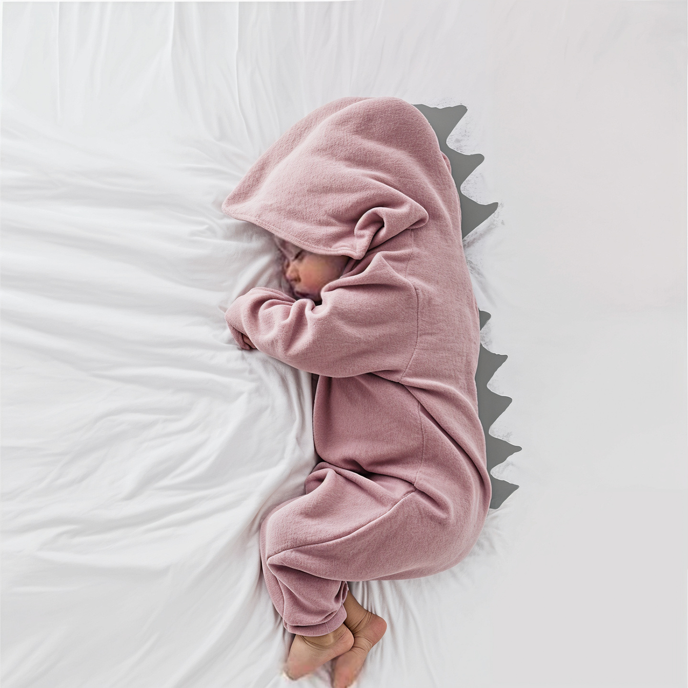 DinoBaby Jumpsuit – Soft Onesie with Hood and Playful Back Details